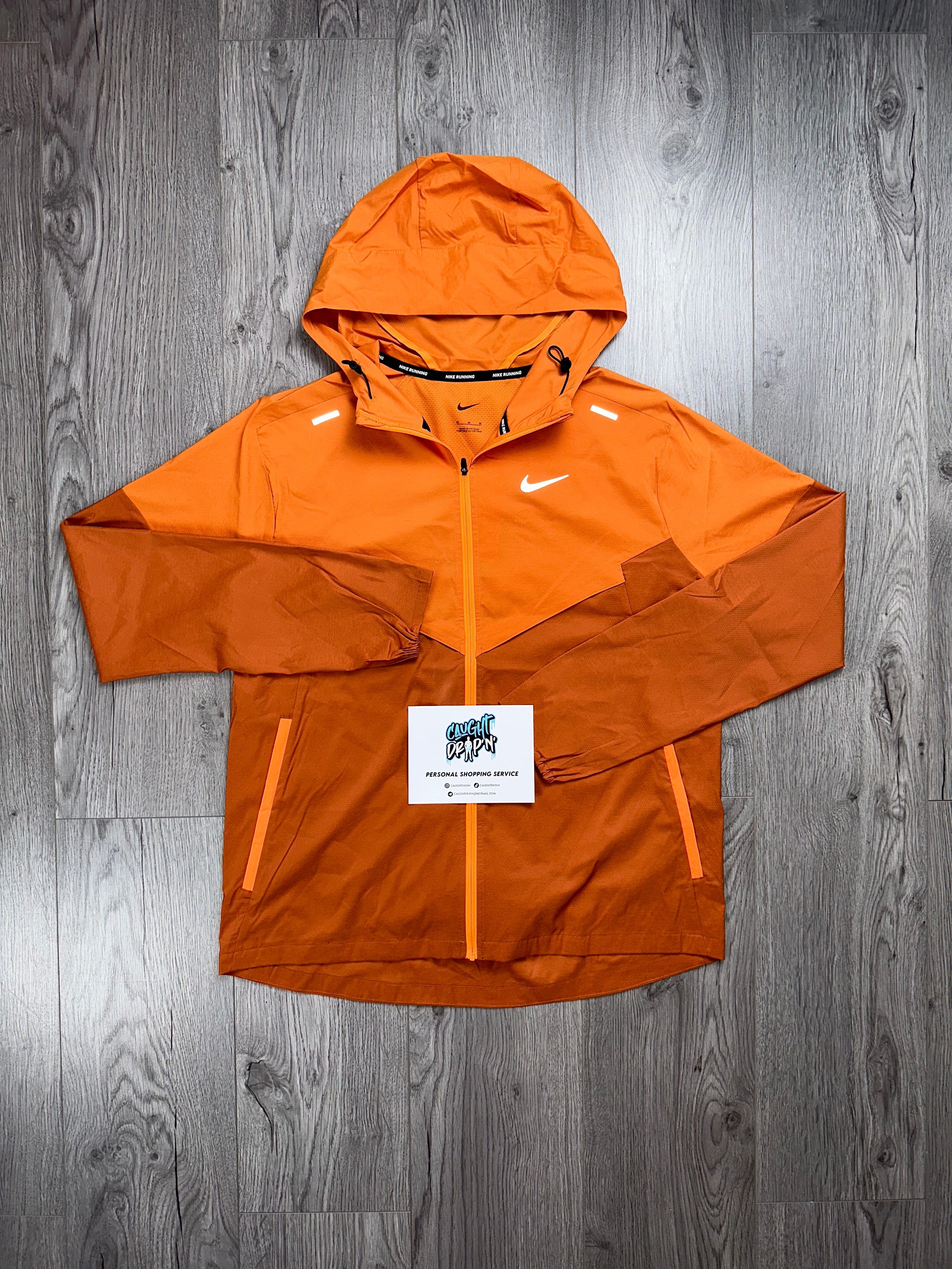 Nike orange running online jacket