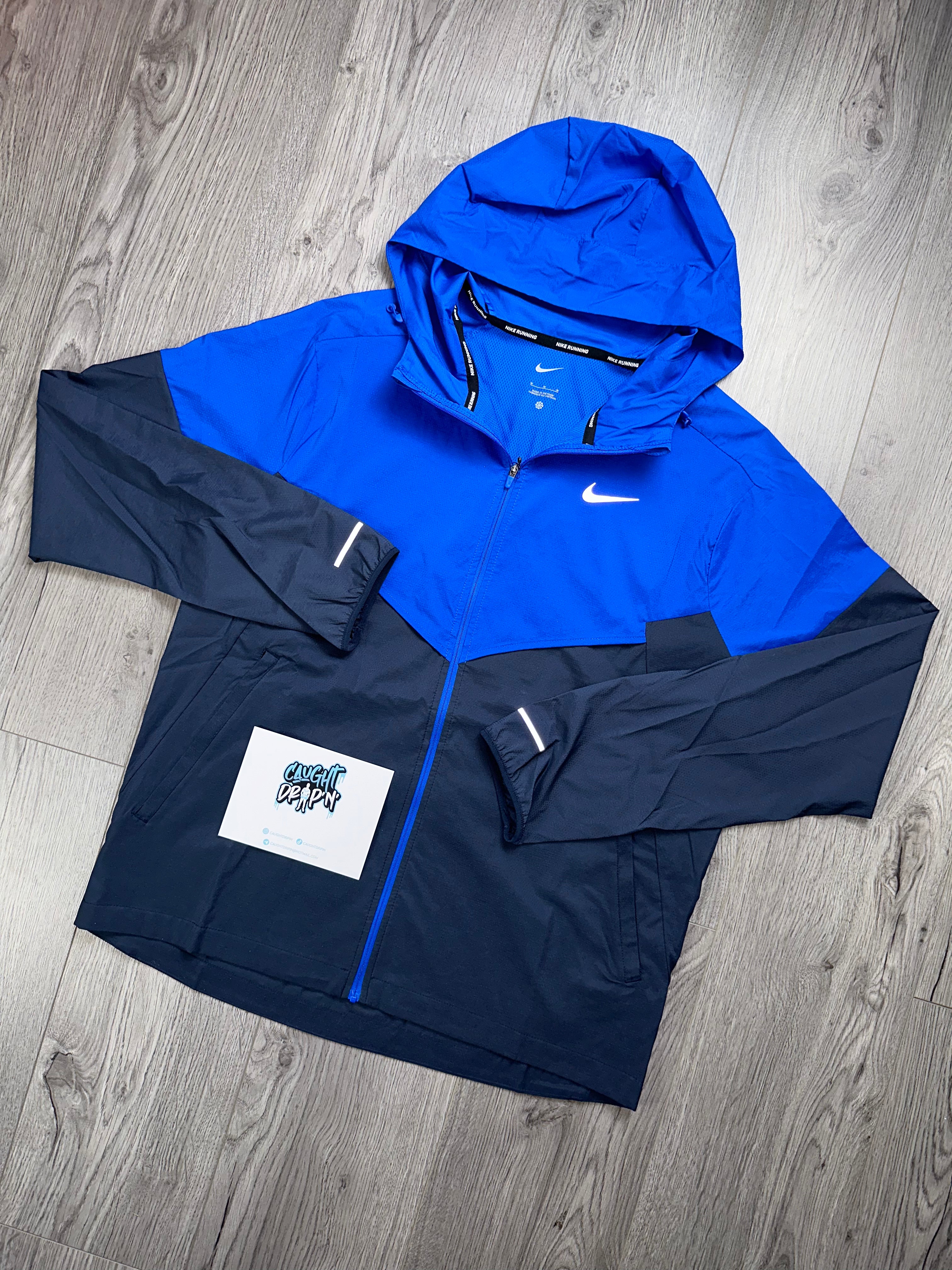 Royal blue sale windbreaker nike