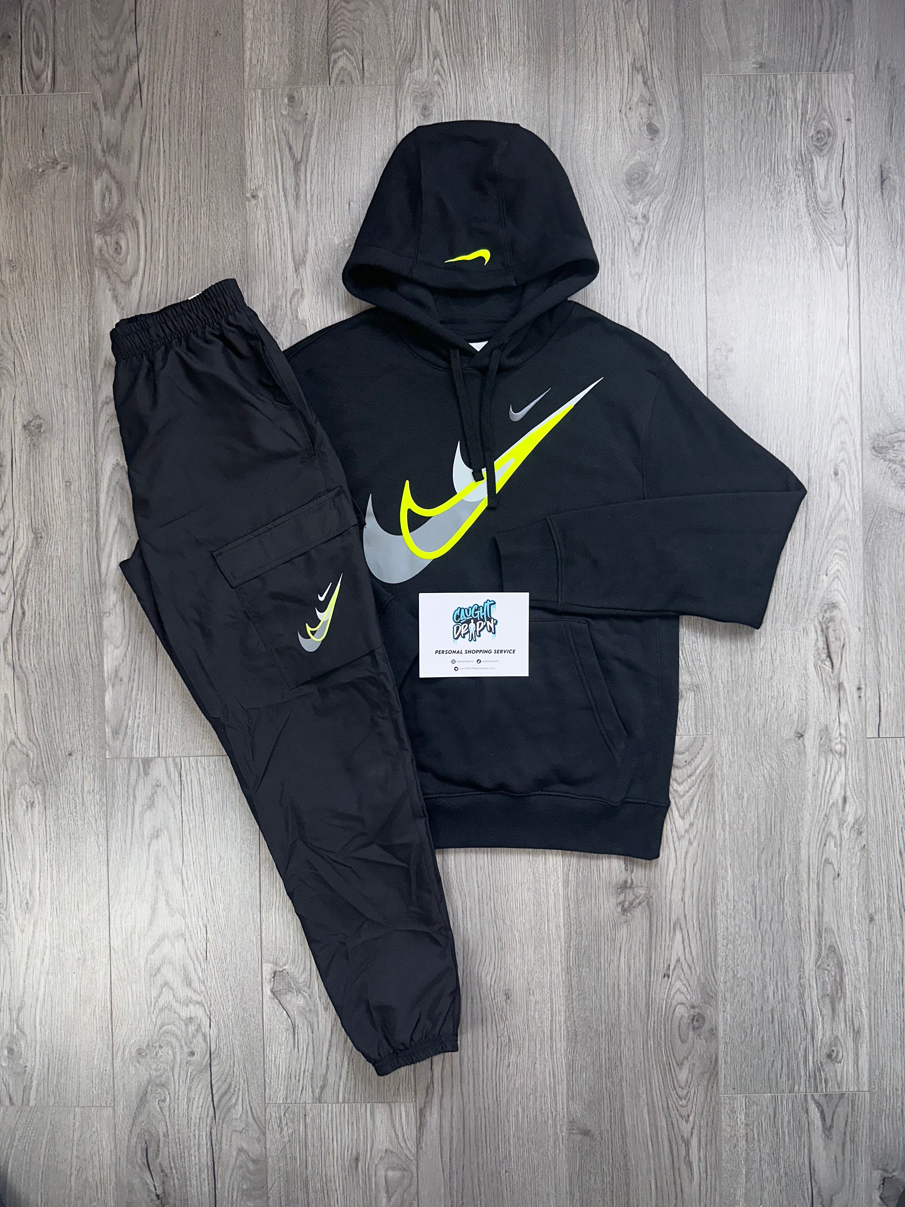 Black and lime store green nike tracksuit