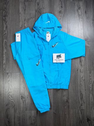 Nike Multi Swoosh Cargo Full Zip Tracksuit | Baltic Blue