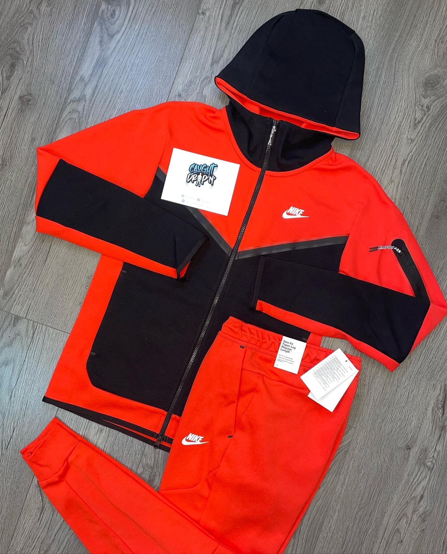 Red nike air on sale tracksuit